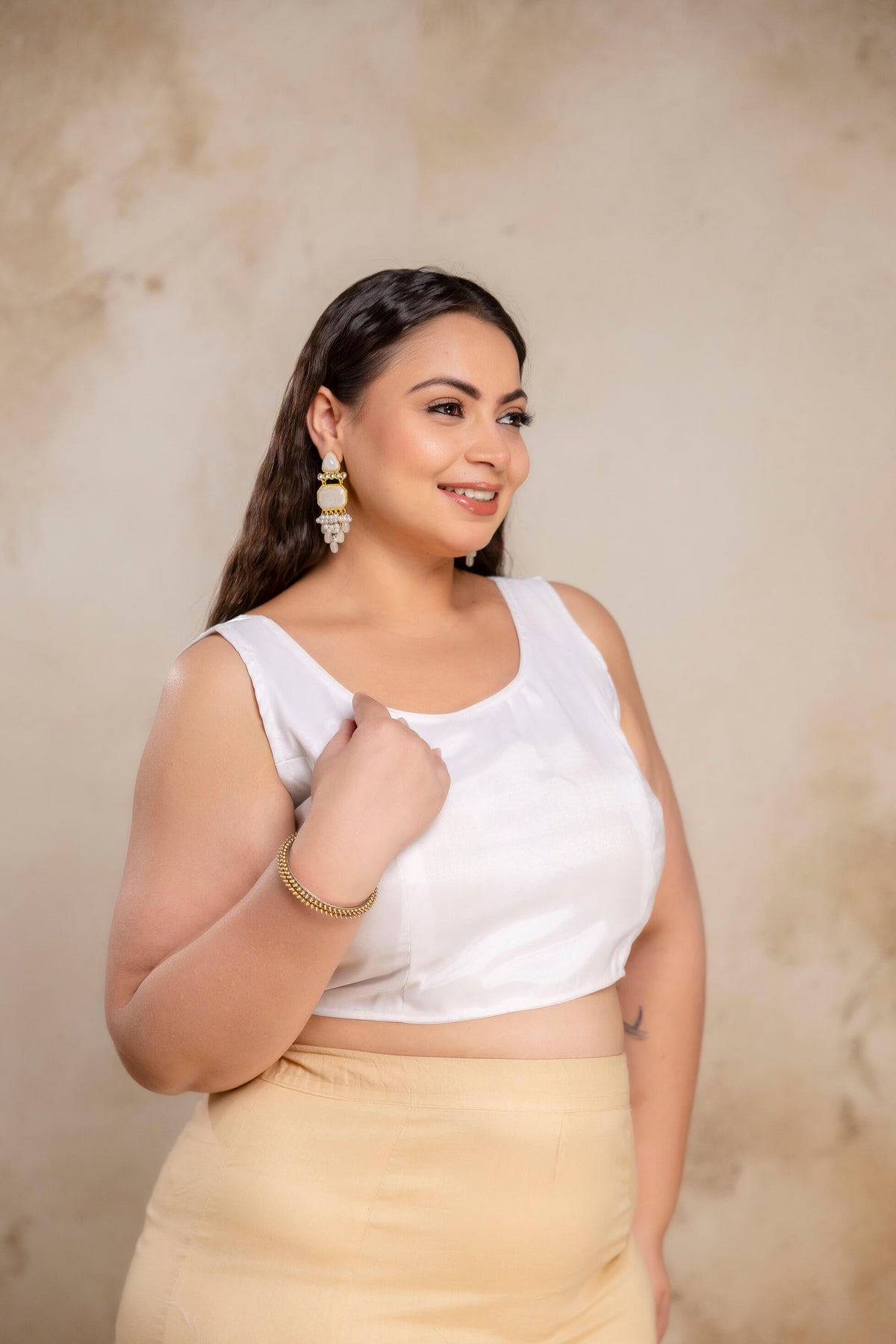 Plus size white Jimmy Choo blouse side view on fat women, flattering fit blouse for curvy full figure