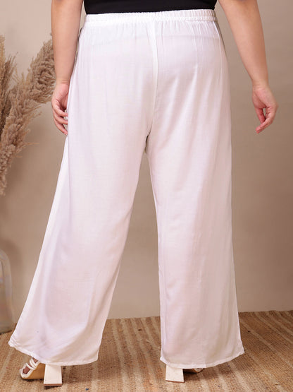 Back view of white rayon palazzo pants for curvy women, relaxed fit and soft drape – Curvisha