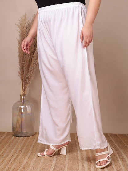 Front view of plus size white rayon palazzo pants with elastic waistband and pockets – Curvisha big size