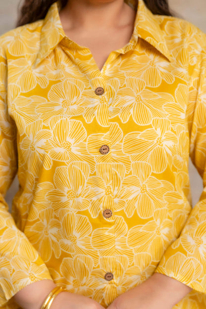 Close-up of plus size yellow floral cotton kurti buttons for women, premium big size clothing detail