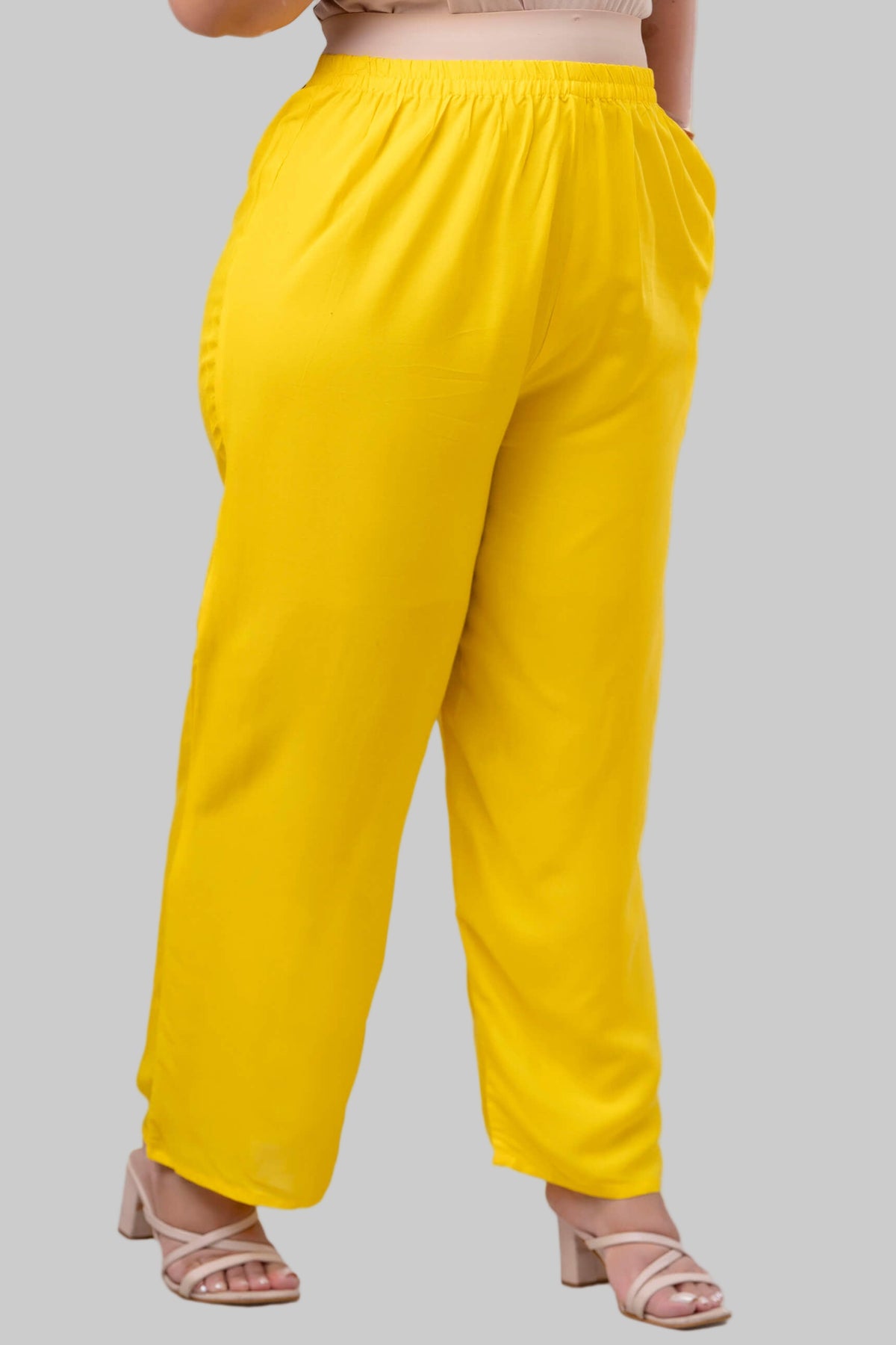 Side view of yellow rayon palazzo pants for fat women clothing, breathable relaxed fit – Curvisha