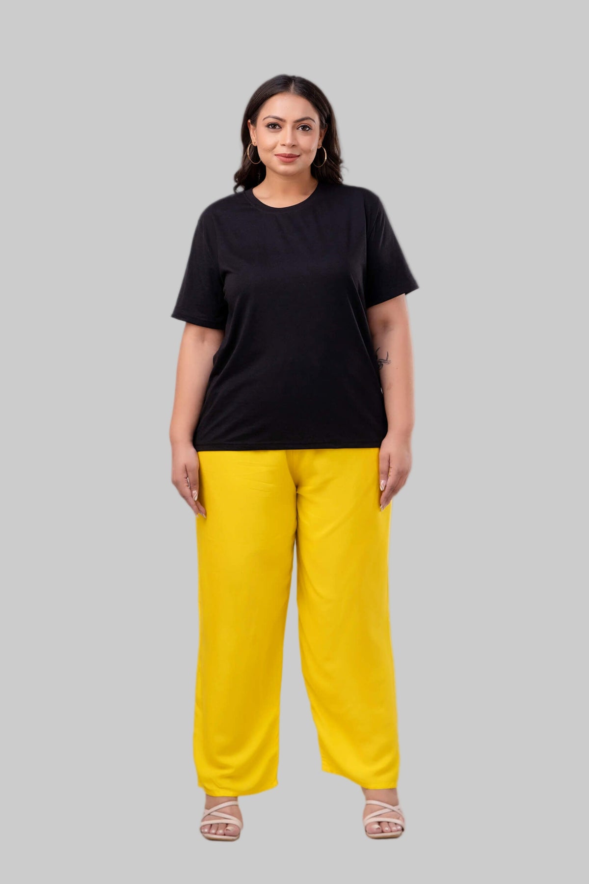 Yellow rayon palazzo styled with black top for curvy women, bright and trendy outfit – Curvisha