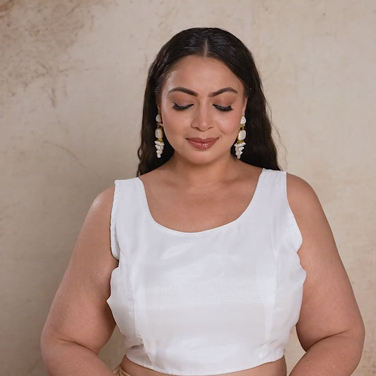 Curvisha curvy fashion white satin saree blouse with adjustable back-tie knot, perfect for plus size wedding guest outfits.