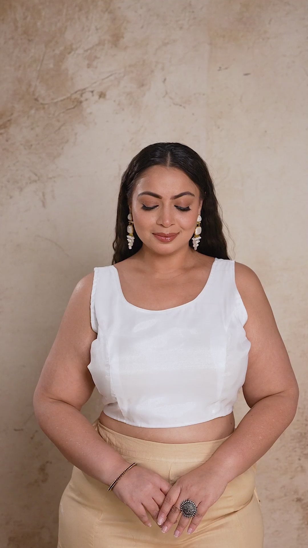 Curvisha curvy fashion white satin saree blouse with adjustable back-tie knot, perfect for plus size wedding guest outfits.