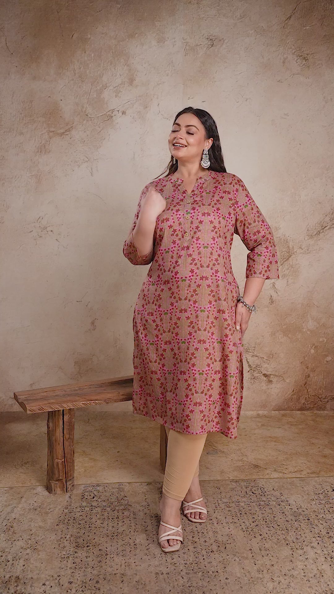 Plus size pink and brown floral print cotton kurti by Curvisha with 3/4 sleeves, featuring a breathable daily wear fit for curvy women.