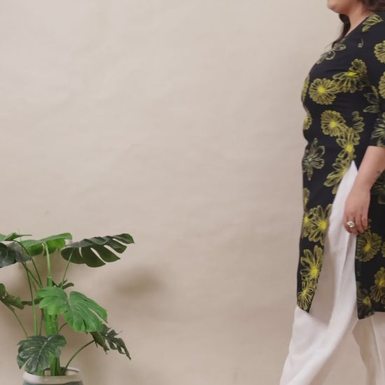 Curvisha black and yellow floral print plus size straight kurta designed for a sleek and trendy appearance.