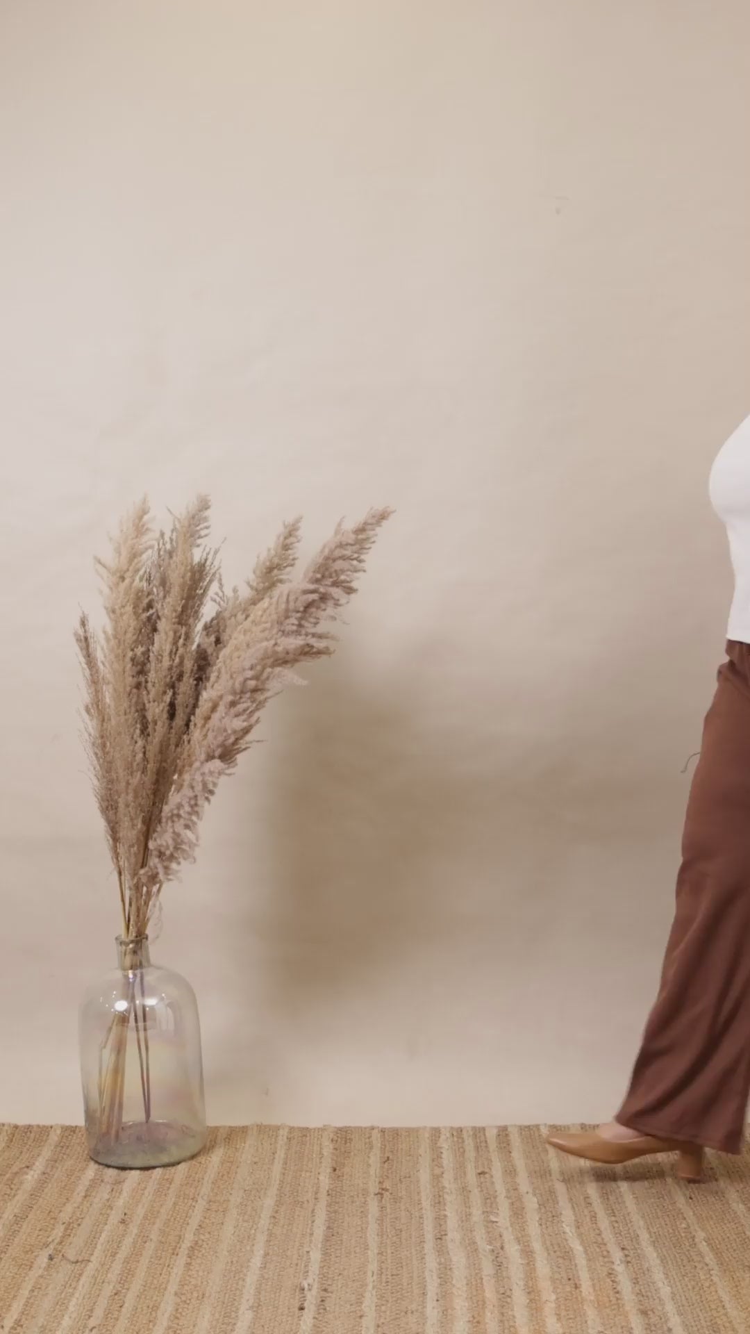 Close-up of Curvisha brown ribbed lounge pants for plus-size figures, showing the durable fabric quality and flattering wide-leg silhouette.