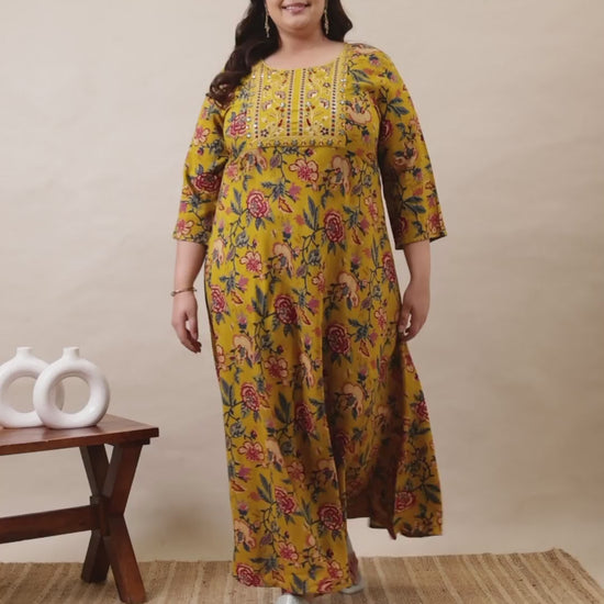 Curvisha mustard yellow plus size floral maxi dress with an embroidered yoke and 3/4 sleeves, a comfortable and stylish ethnic choice.