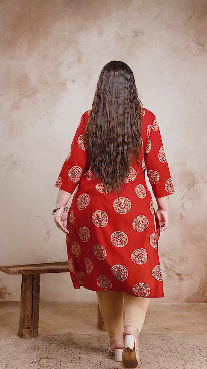 Flowy plus size red floral kurta with side slits, model walking shot showing the airy and comfortable fit for fat women.