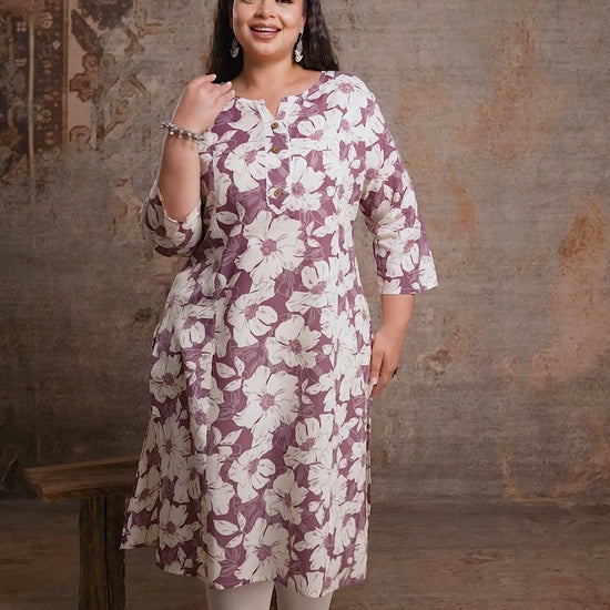Close-up shot of Curvisha plus size purple floral kurta fabric and print detail, designed for elegant curvy ethnic fashion.