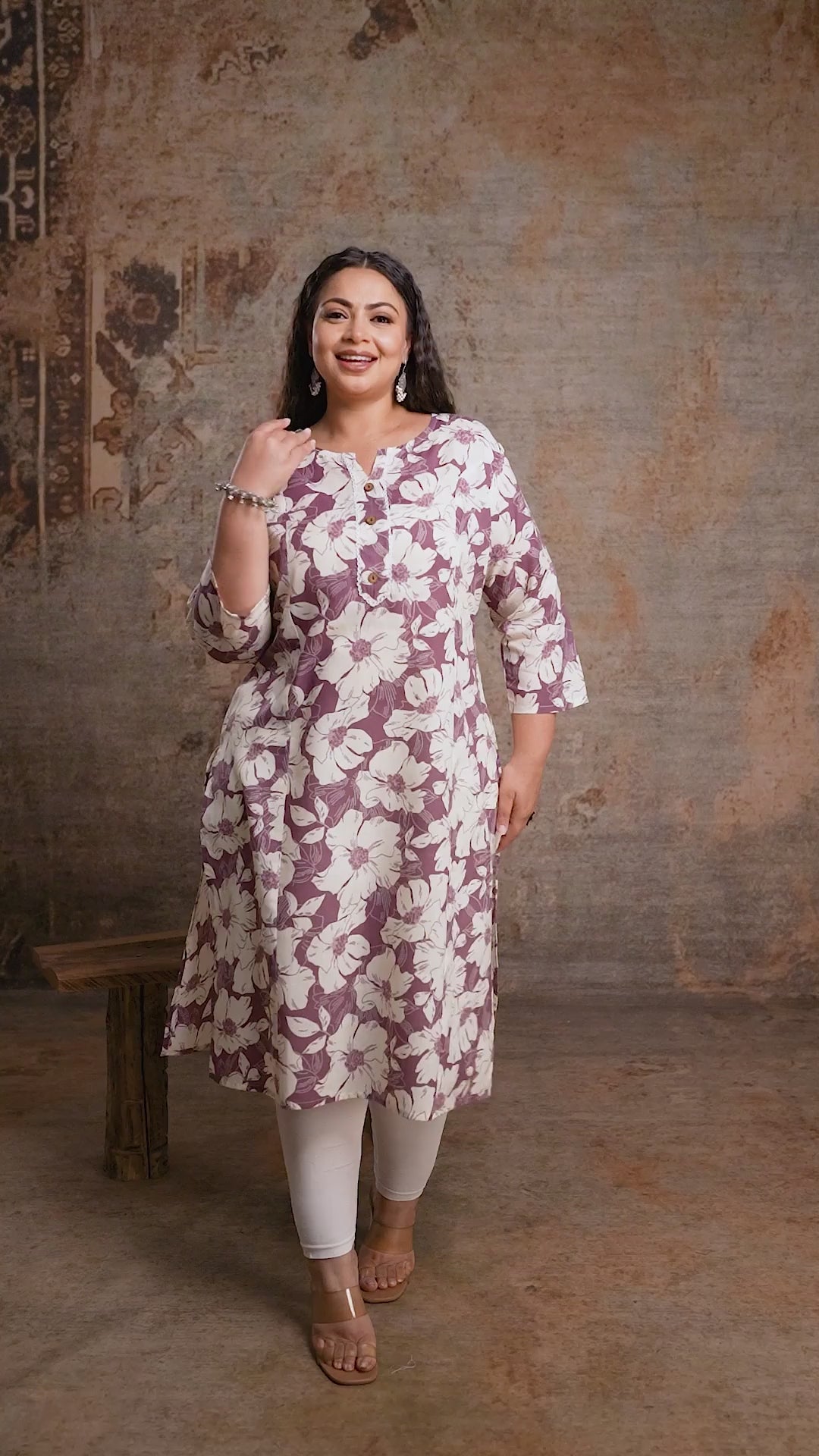 Close-up shot of Curvisha plus size purple floral kurta fabric and print detail, designed for elegant curvy ethnic fashion.