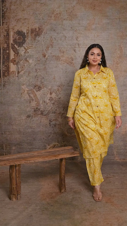 Full view of Curvisha plus size yellow floral kurta and pant set, showcasing a complete ethnic look for curvy body types.