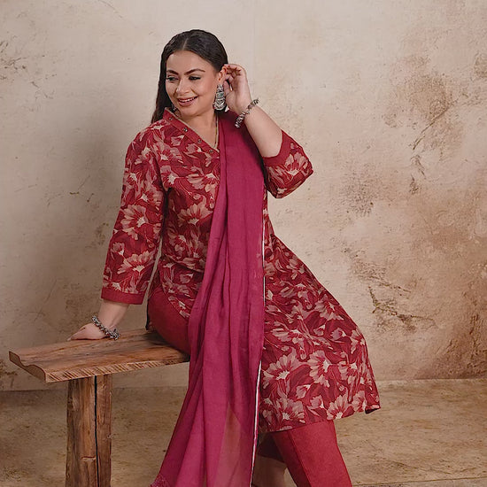 Elegant red floral plus size suit set with solid plain dupatta by Curvisha, perfect for festive wear and special occasions.