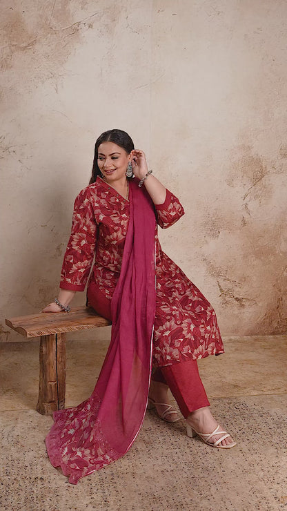 Elegant red floral plus size suit set with solid plain dupatta by Curvisha, perfect for festive wear and special occasions.