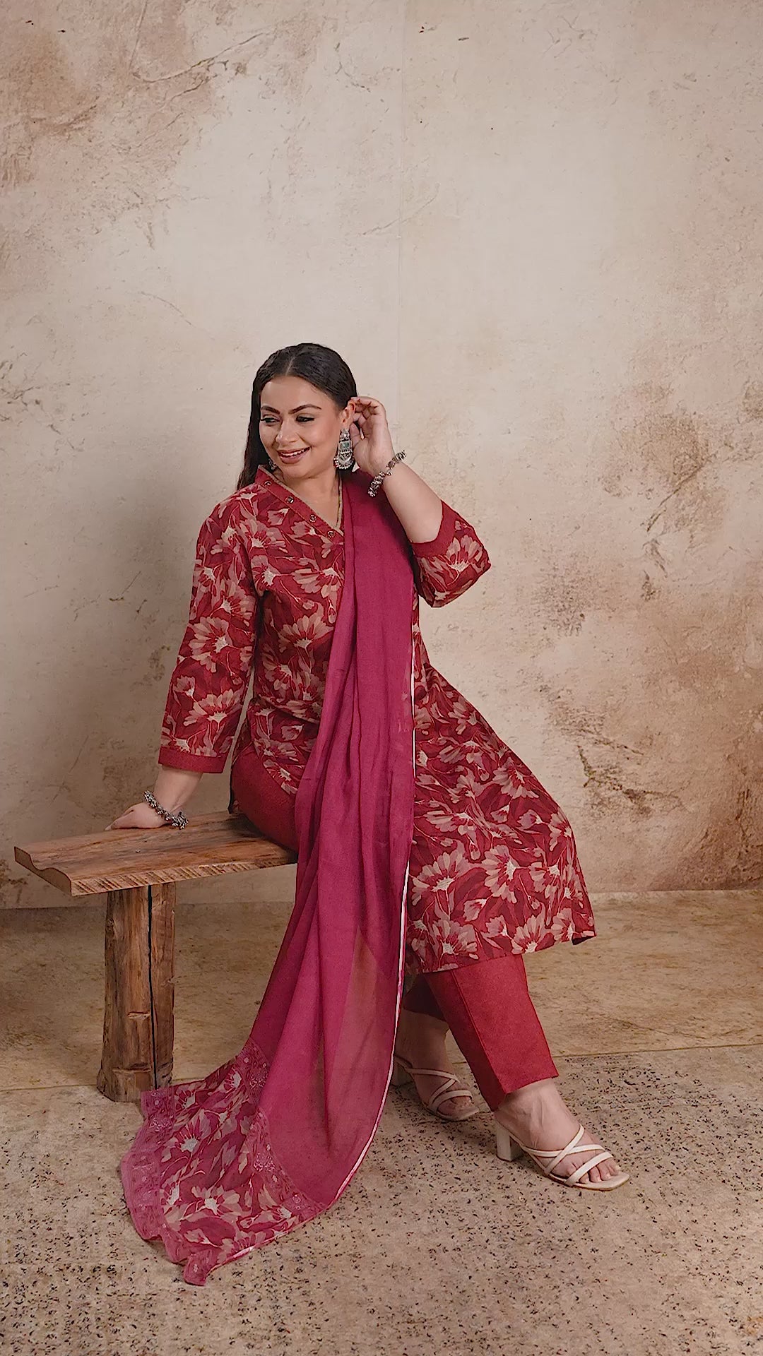 Elegant red floral plus size suit set with solid plain dupatta by Curvisha, perfect for festive wear and special occasions.