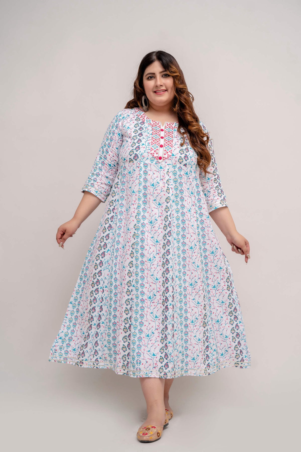 Plus size white and turquoise floral rayon gown with neckline detail